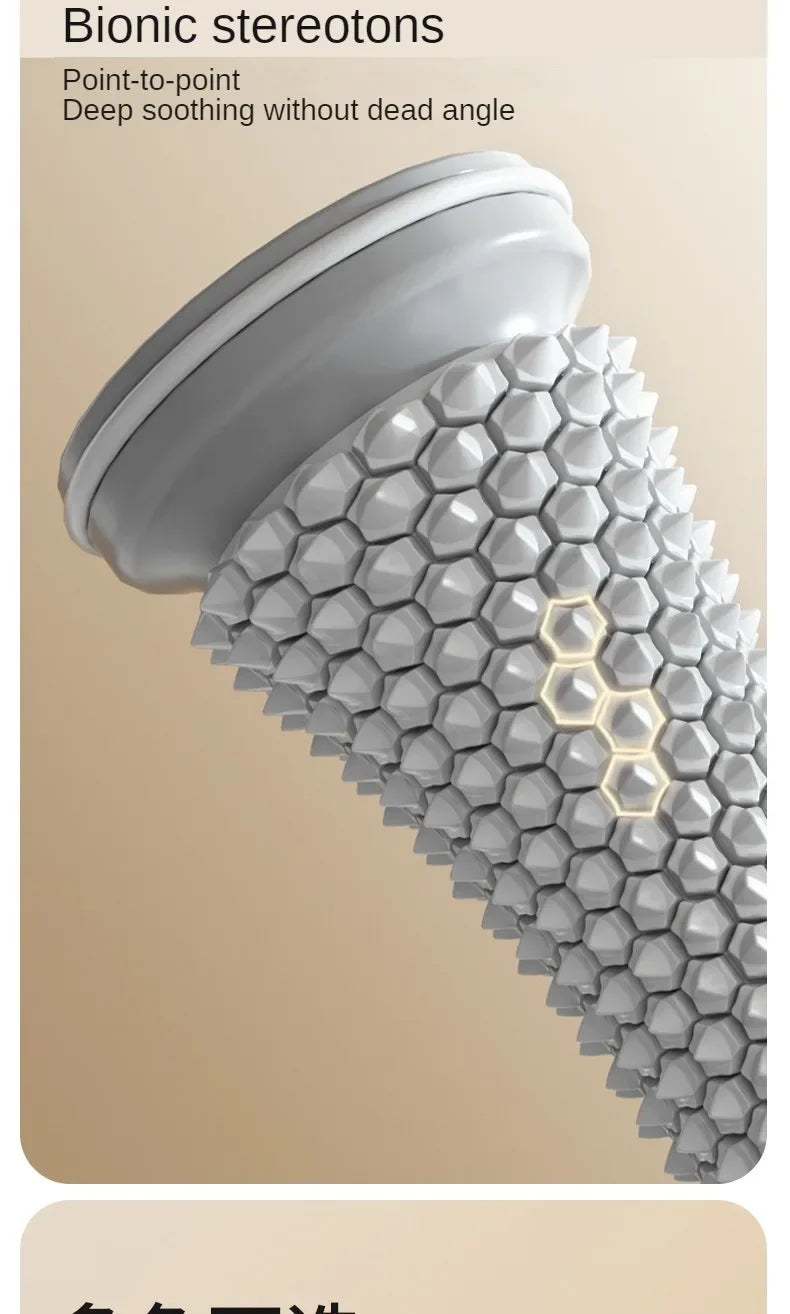Grey plastic manual foot massager roller with spiky honeycomb texture for plantar fasciitis and muscle relaxation.