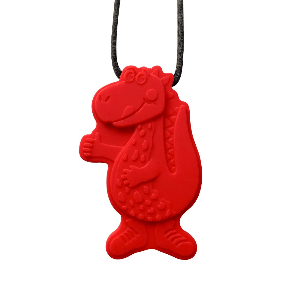 Red dinosaur silicone teething toy pendant for baby teething relief.