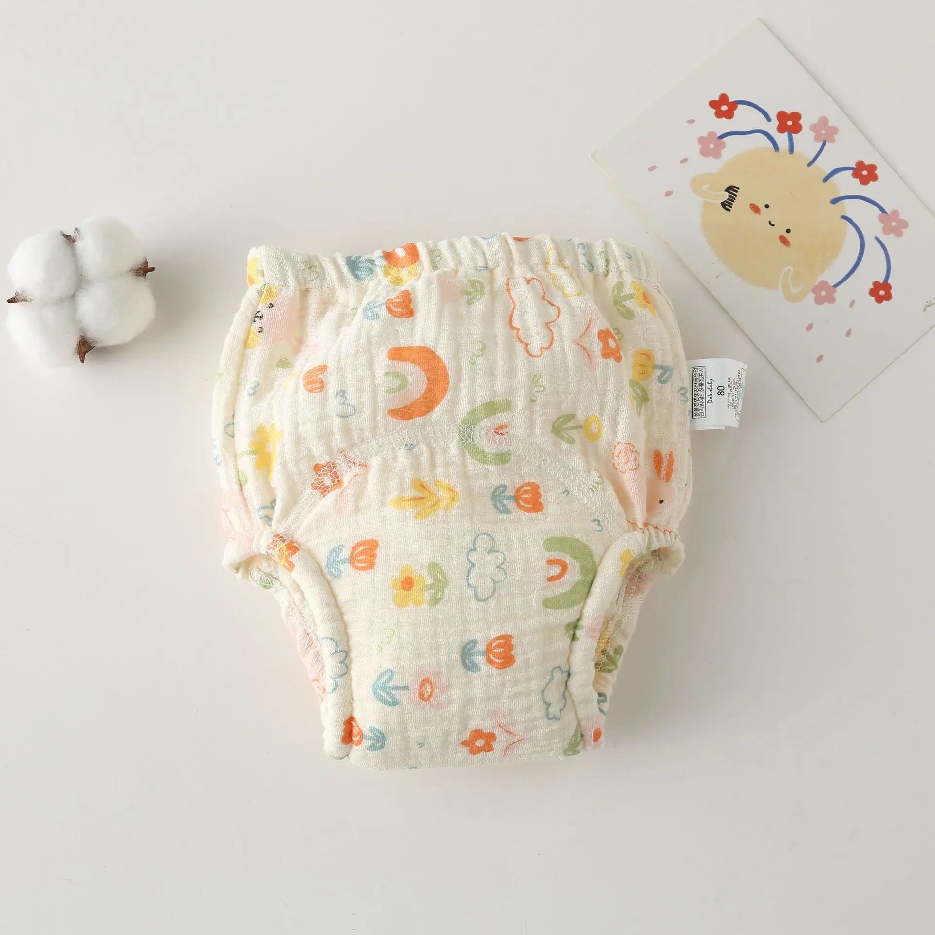 Baby care training diaper size 80, muslin cotton with cute rainbow and floral print for babies.