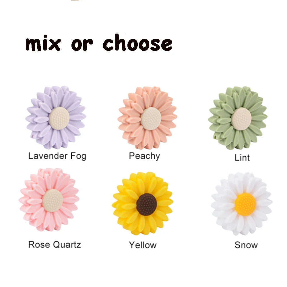 Colorful silicone flower baby teething toys in lavender, peach, green, pink, yellow, and white.