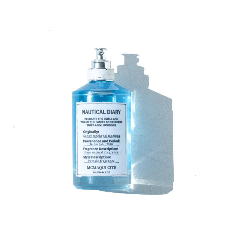 McMaqui Cite Nautical Diary unisex 100ml EDT, blue bottle, fresh natural sandalwood & musk perfume, long-lasting scent.