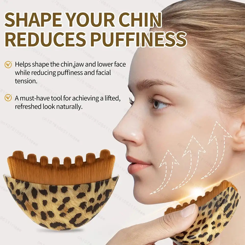 Leopard print curved facial sculpting brush with dense brown bristles for jawline massage and lymphatic drainage.