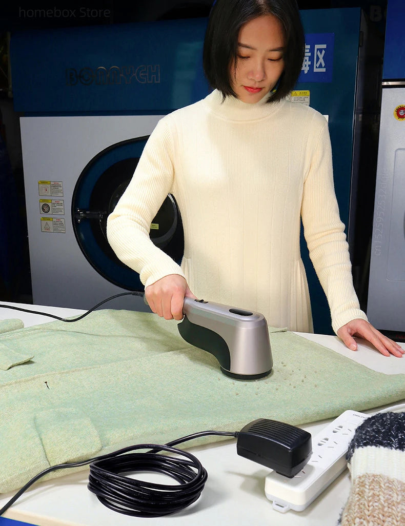 Tidesmit 60W professional lint remover machine showing side features and spool mechanism for commercial garment care.