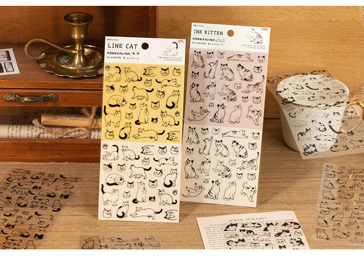 Two sheets of cute cartoon cat PET stickers for DIY scrapbooking, journaling, and pet-themed craft decorations.