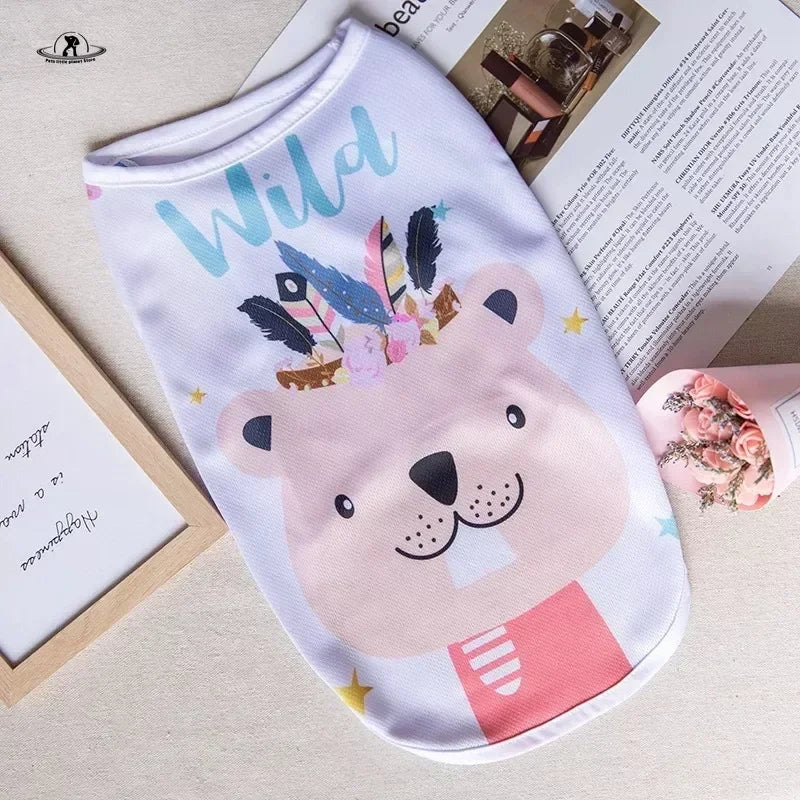 Cute summer cartoon puppy vest for small dogs. Lightweight white shirt with tribal bear print for comfy pet style.