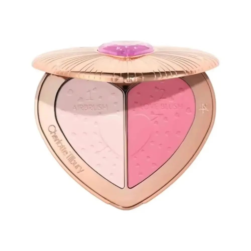 Charlotte Tilbury heart-shaped blush compact with light pink and vibrant pink pressed powder shades in gold case.