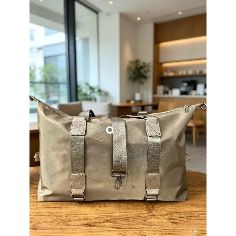 Waterproof yoga gym crossbody bag in khaki beige with webbing straps and front tag