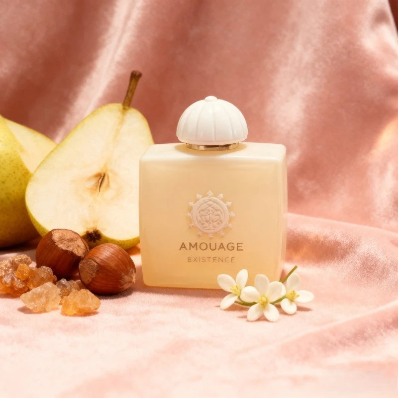 Amouage 100ml Eau De Parfum bottle on pink velvet with pear, hazelnuts, and white flowers. Elegant floral fragrance.