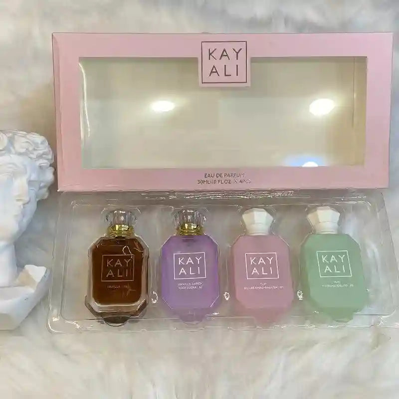 KAYALI unisex EDP perfume set: 4x30ml bottles with vanilla, pistachio, and marshmallow notes in a luxury travel box.