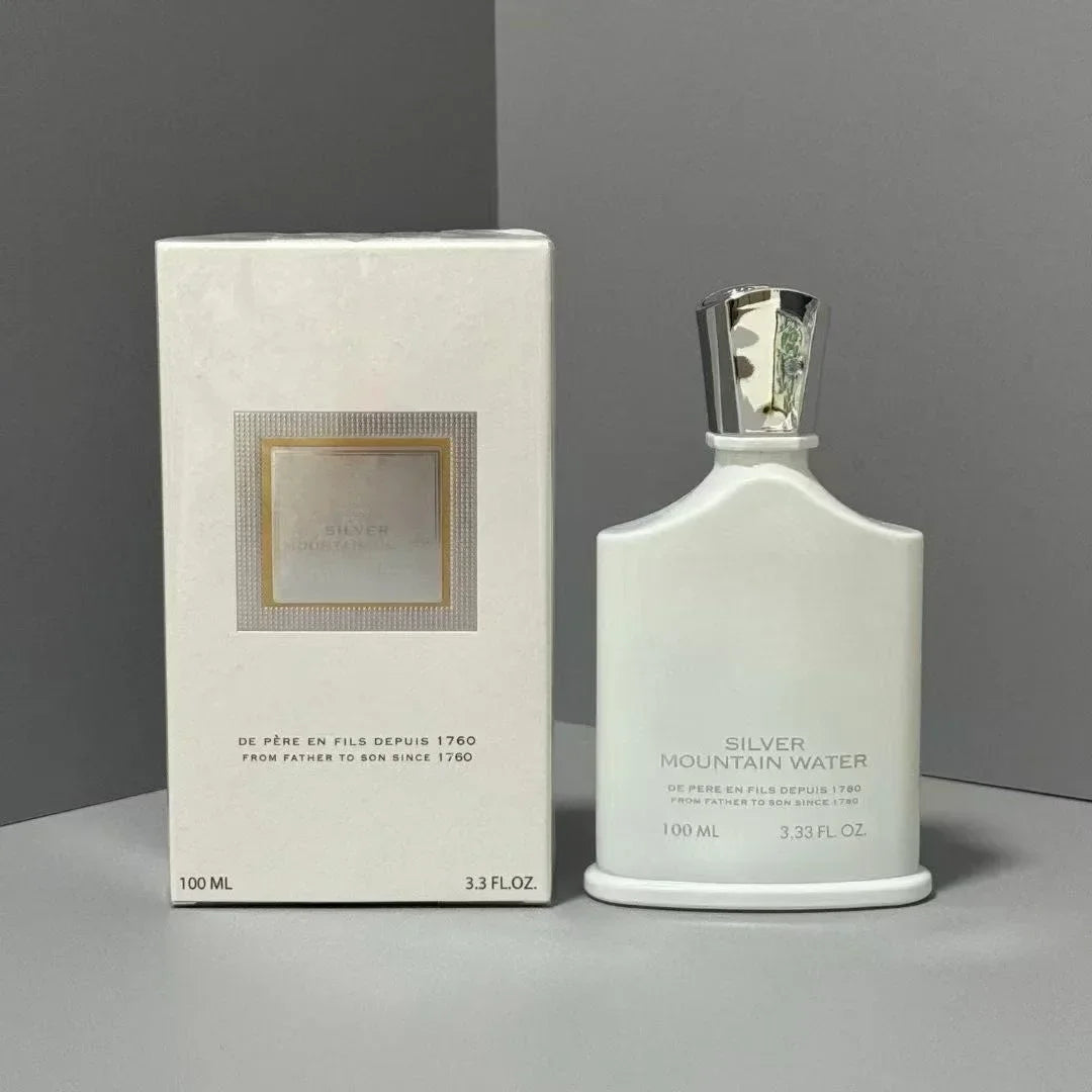Creed Silver Mountain Water 100ml parfum: white bottle, unisex fruity fragrance with metallic cap and original box.