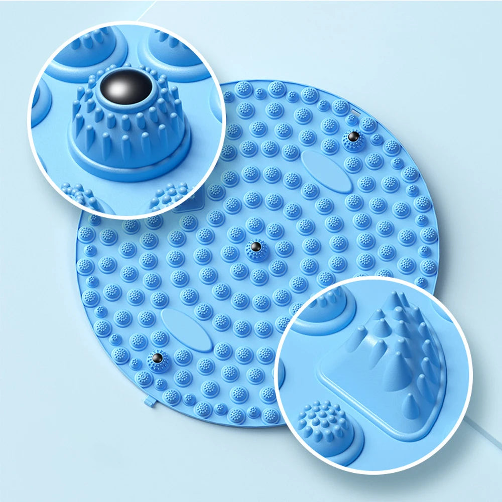 Blue circular acupressure foot massage mat with textured nodes and magnetic points for health and reflexology training.
