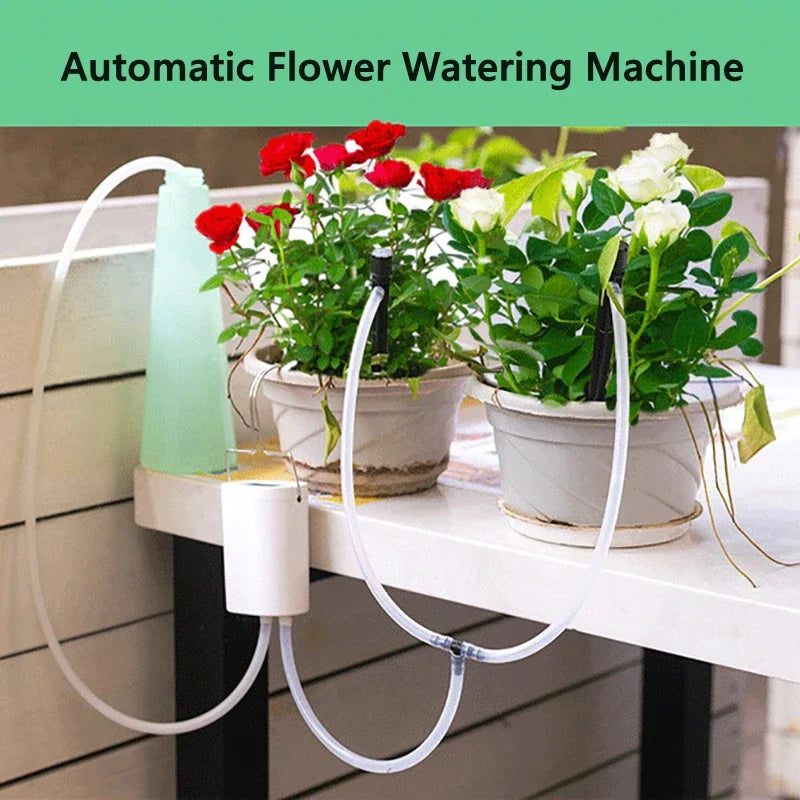 Automatic plant watering timer controller with tubes connected to potted flowers