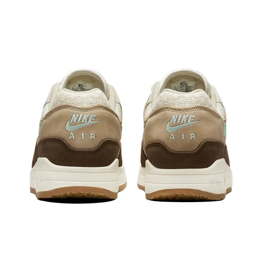 FD5088-200 Nike Air Max 1 with Air Cushioning and Non-Slip Sole: Unisex Running Shoes for Trendy Casual Wear