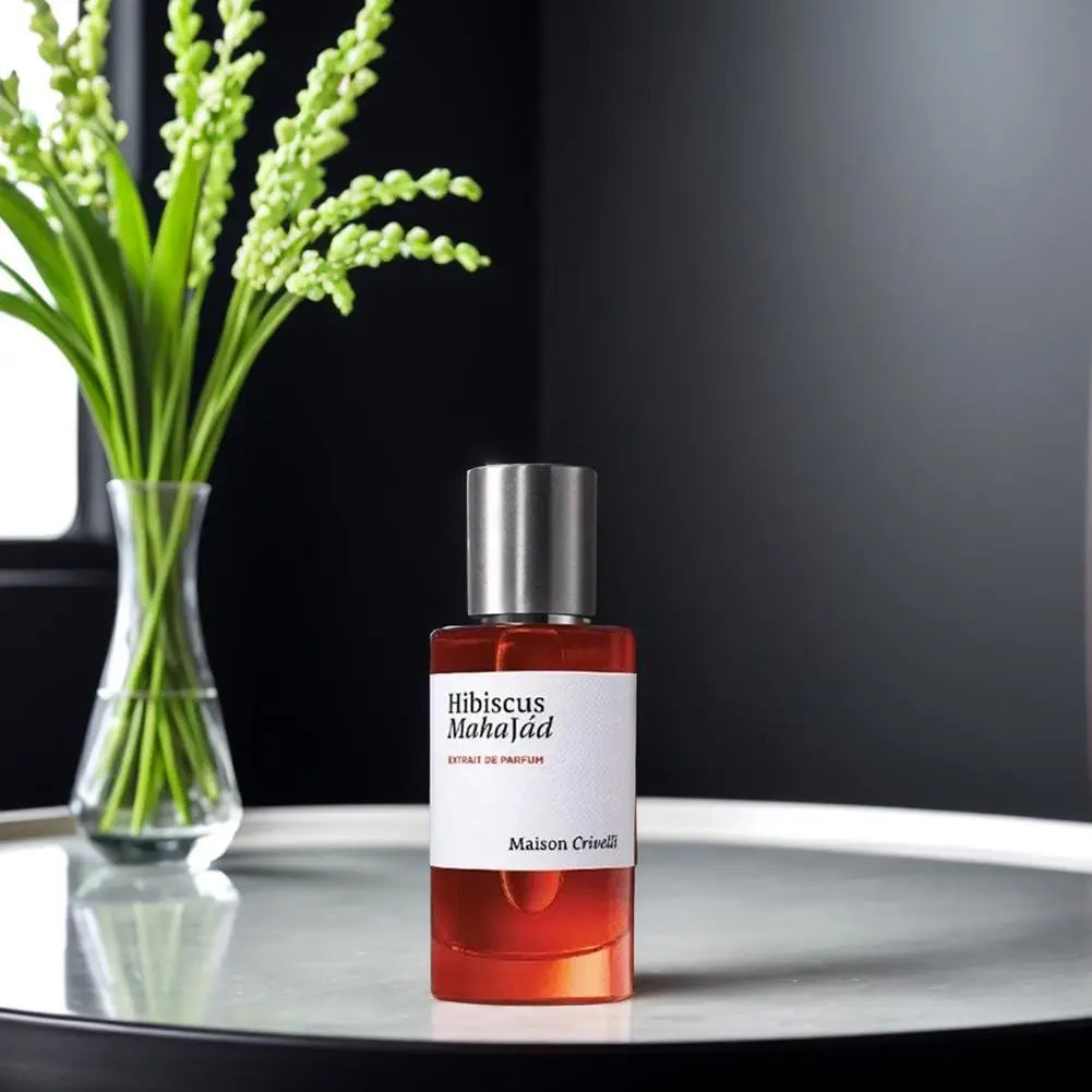 Maison Crivelli Hibiscus Mahajád Extrait de Parfum, unisex amber floral scent in a minimalist glass spray bottle.