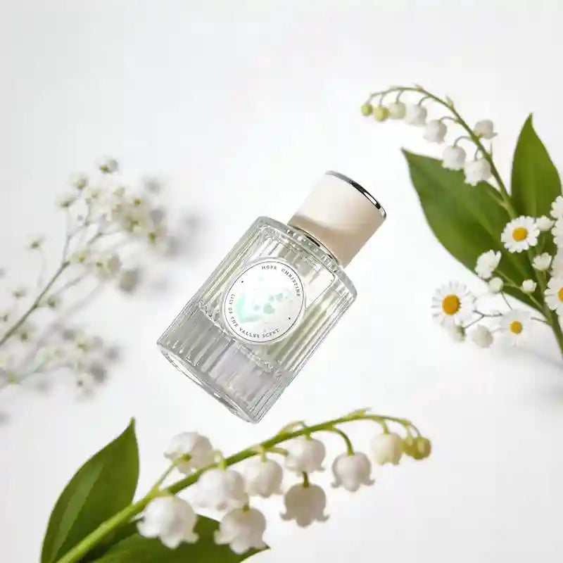 Hope Christine Lily of the Valley EDT: Ribbed glass bottle, fresh floral perfume for women with elegant white cap.