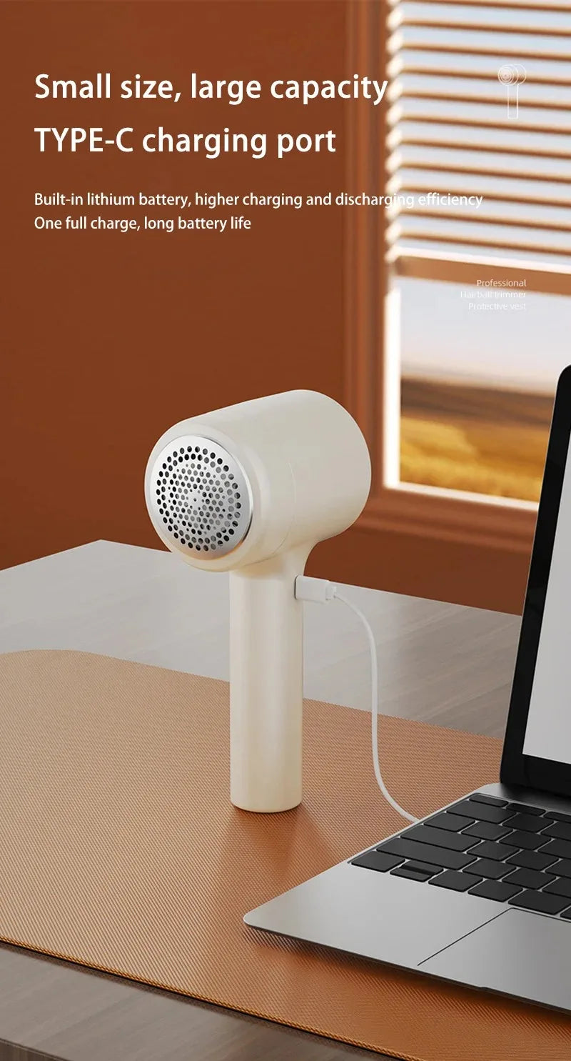 Tidesmit rechargeable fabric shaver removing lint and hair balls from clothing, showing detail of the blade guard.
