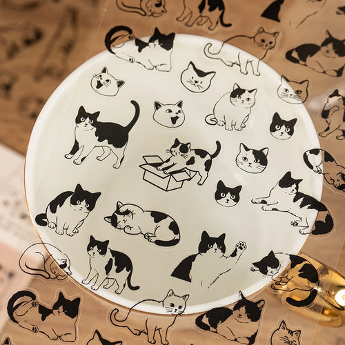 Cat PET sticker sheet with black-and-white cartoon cats on white backing