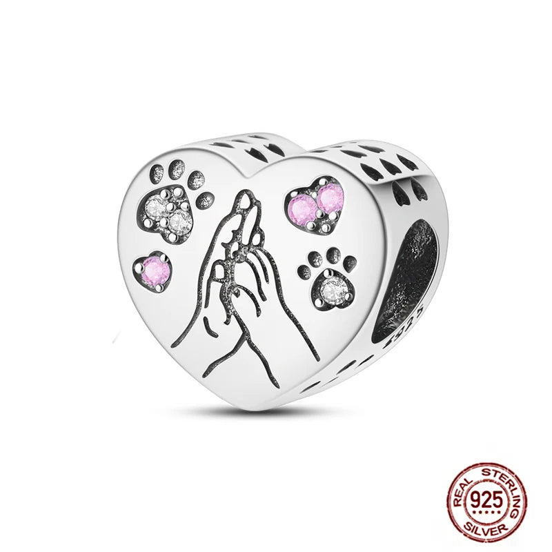 925 sterling silver heart charm with paw prints and pink crystals, perfect for DIY pet-themed charm bracelets.