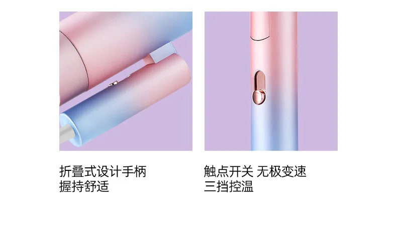 Foldable mini hair dryer with ombre pink-blue finish, speed control switch, and ergonomic handle for quick hair drying.