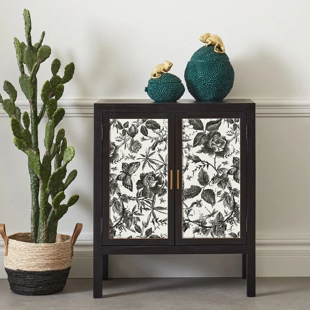 Removable floral peel-and-stick wallpaper applied to cabinet doors, black botanicals