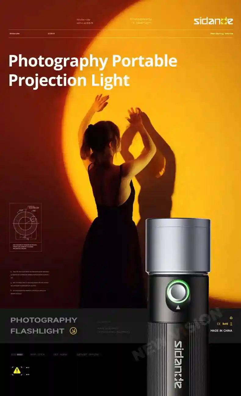 Black and silver cylindrical portable photography projection light with a green ring power button.