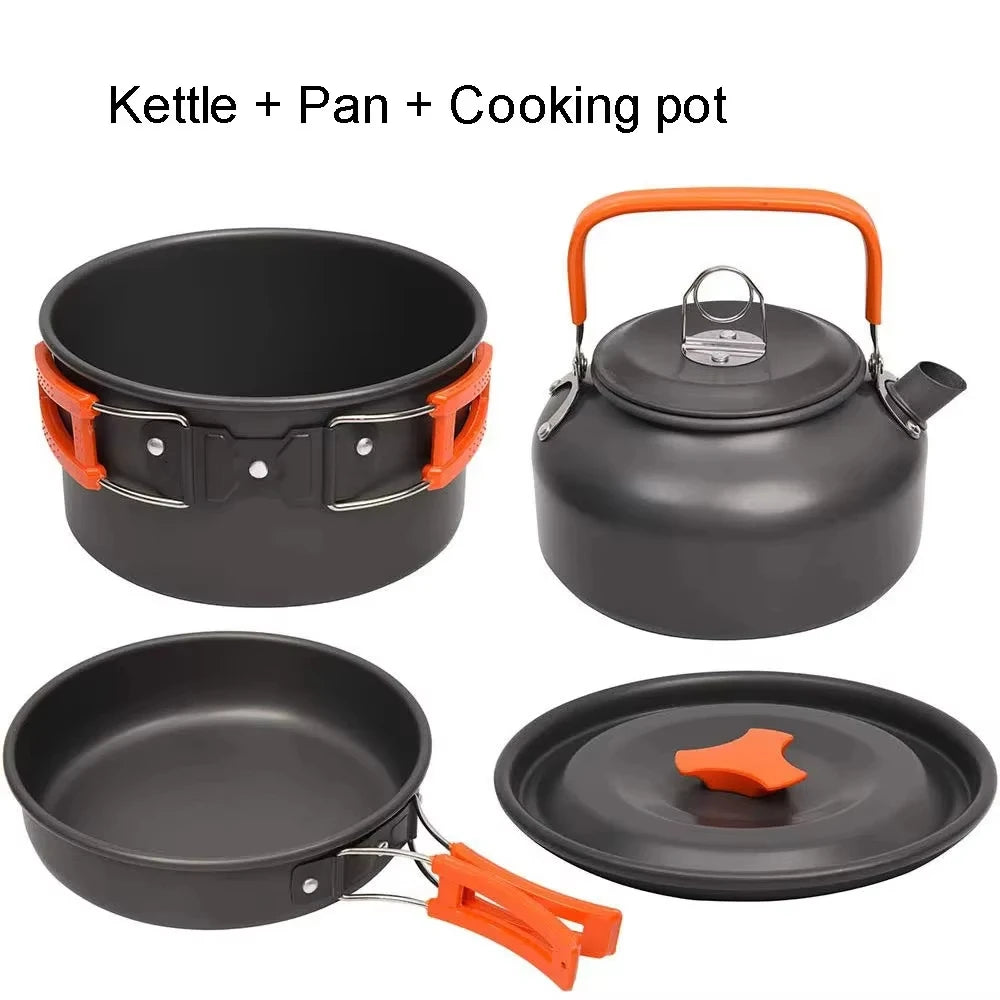 Aluminum camping cookware set with black kettle and pot plus orange silicone accents