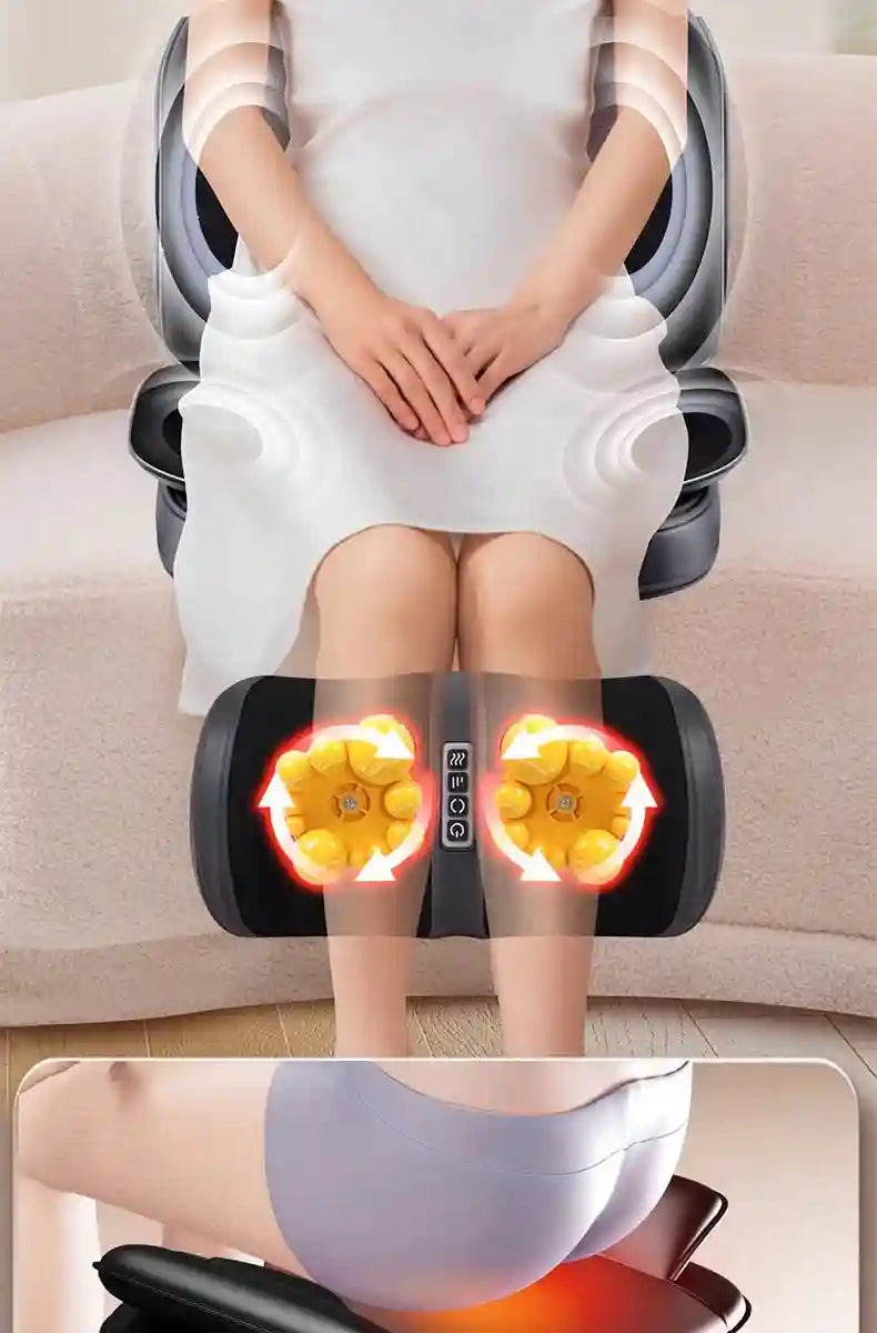 Black shiatsu massage chair pad with glowing yellow kneading rollers, shown in use on a person's legs and back.