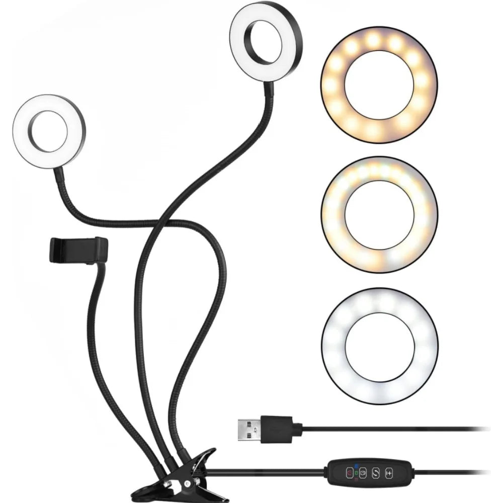 Double ring light with phone holder, flexible gooseneck arms, desk clamp, USB cord, and adjustable light settings.
