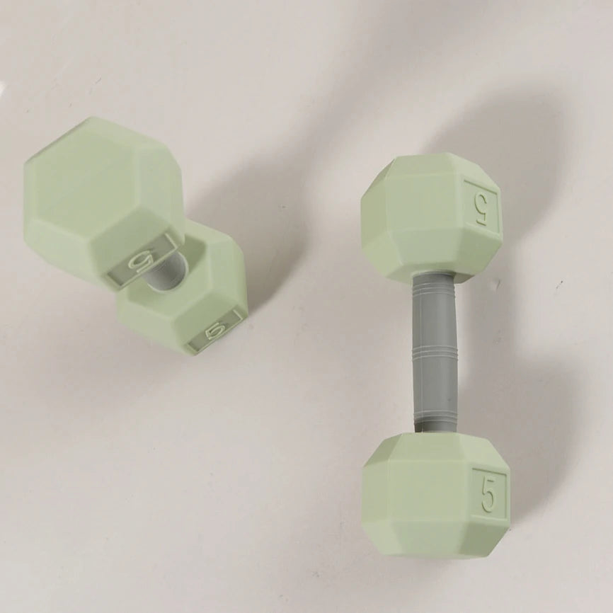 Light green silicone dumbbell teething toy for baby relief.