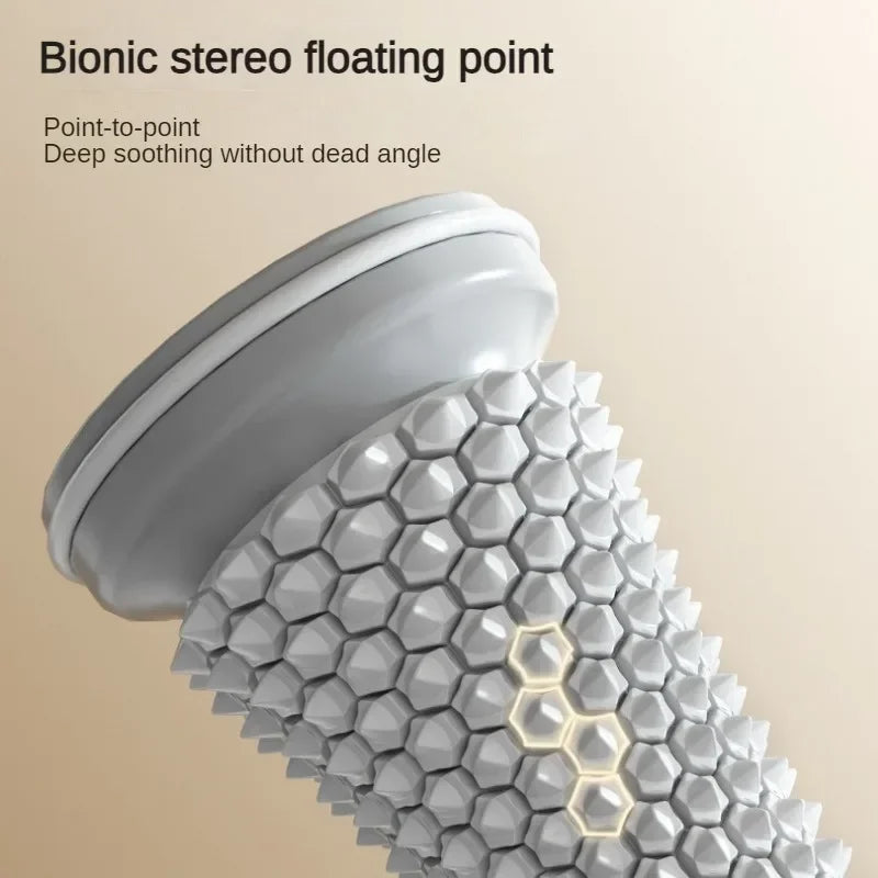 Grey manual foot massage roller with bionic stereo floating point spikes for plantar fasciitis and muscle relaxation.
