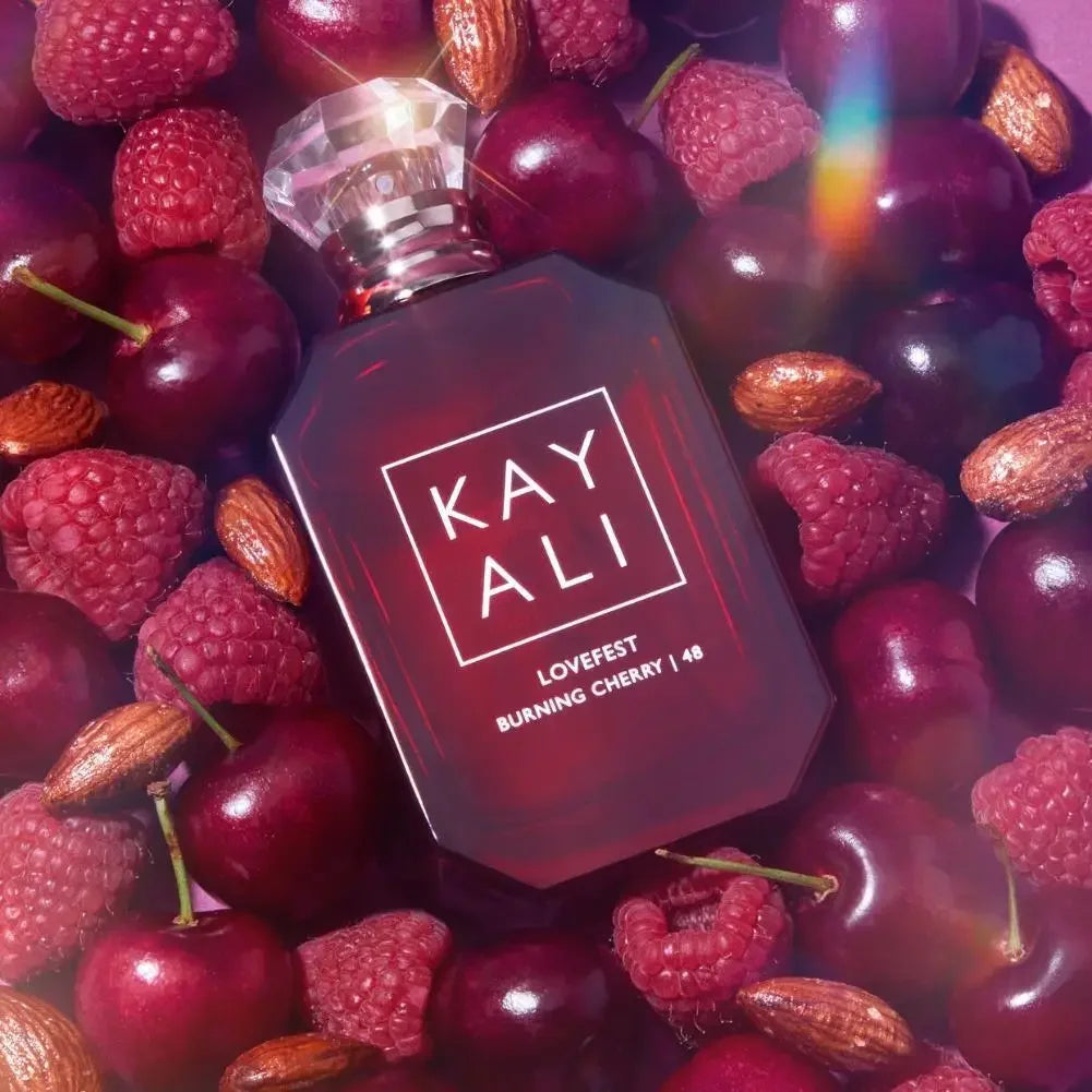 Kayali Lovefest Burning Cherry EDP 100ml: A luxury, long-lasting floral fruity woody perfume in a chic glass bottle.