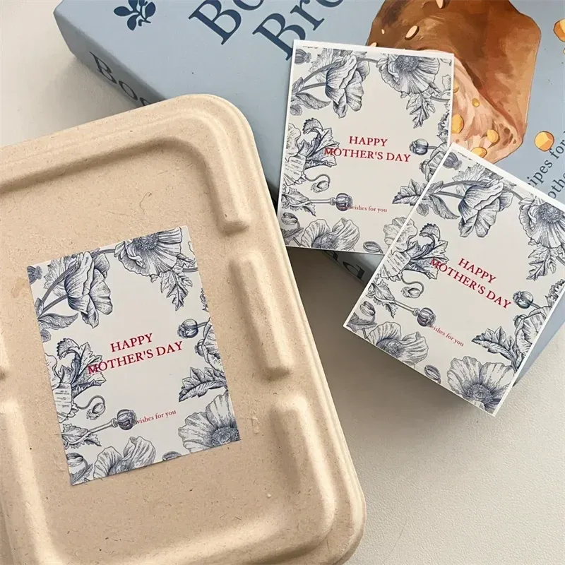 Mother’s Day floral custom sticker labels on beige tray and greeting cards.