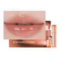 rom&nd Juicy Lasting Tint in Pomelo Skin: nude peach Korean lip gloss with high-shine, hydrating glossy finish.