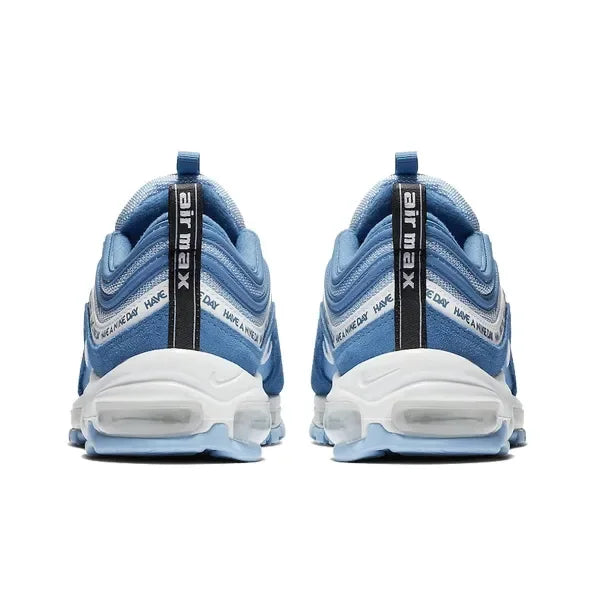 Blue Nike Air Max 97 sneakers, vintage style with "Have A Nike Day" heel tab text and white shock-absorbing soles.