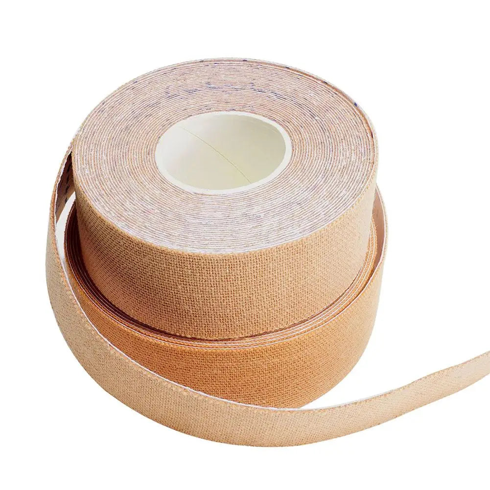 A roll of nude-colored, elastic kinesiology tape for face lifting, showing a fabric texture and a coiled design.