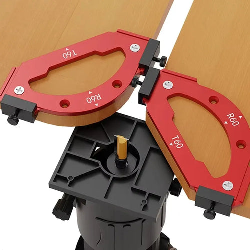 Red radius jig pair mounted on wood, with semicircle opening and black clamps