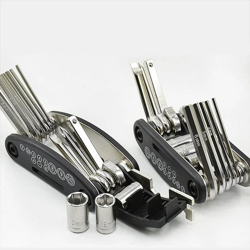 Folding hex key multi tool with socket heads and metal bit stems on black base