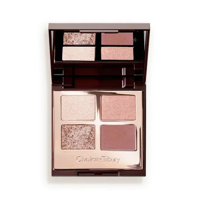 Tidesmit 9 color rose pink eyeshadow palette showing diverse pearly matte and glitter makeup texture close-up