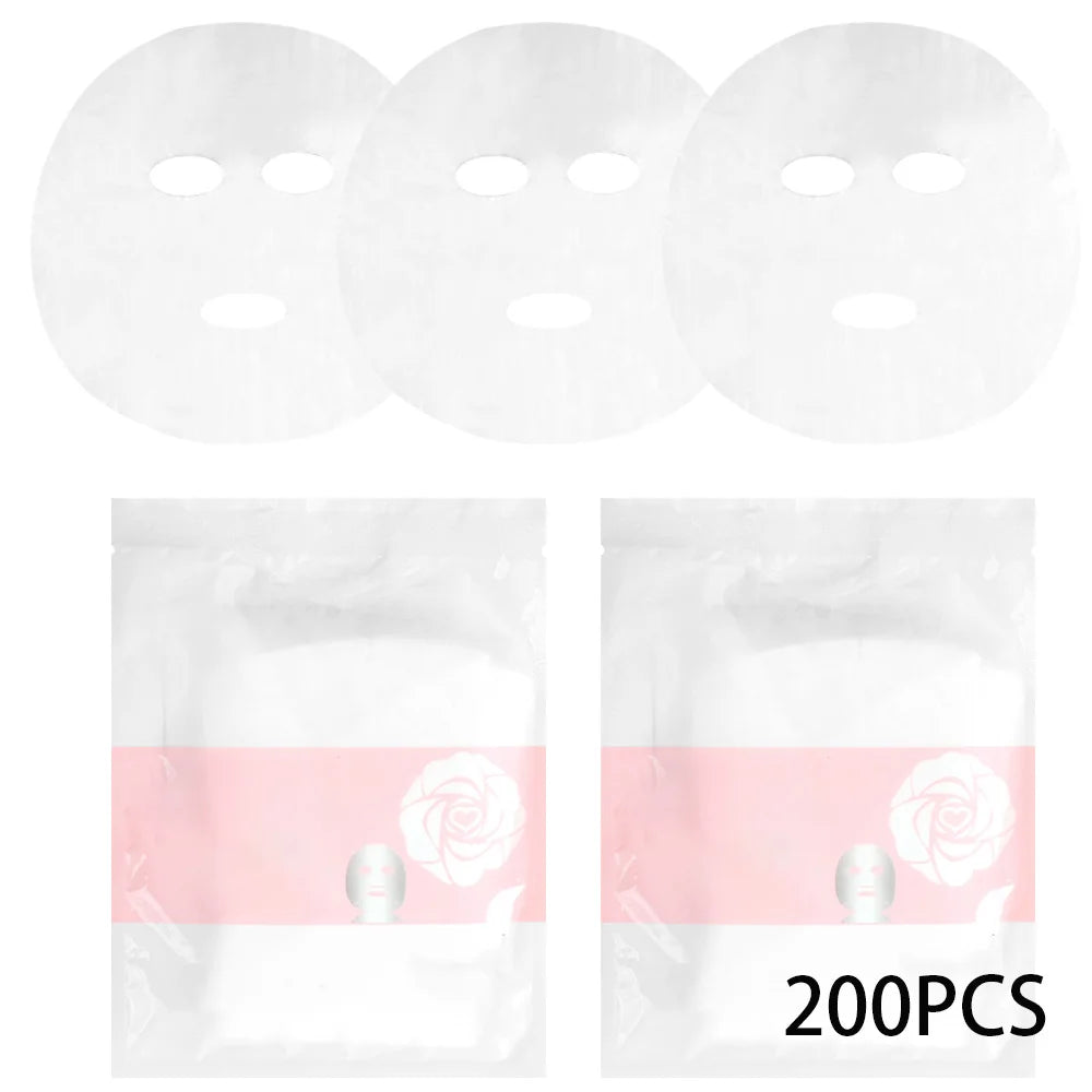 Three round, translucent white facial mask sheets above two pouches labeled "200PCS" with a rose and mask graphic.