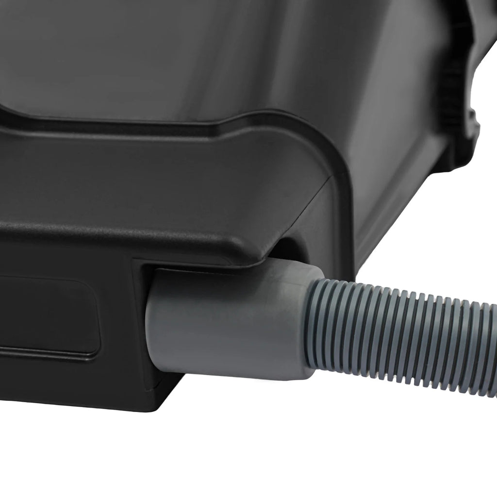 Close-up of black planter connector with gray corrugated hose attached