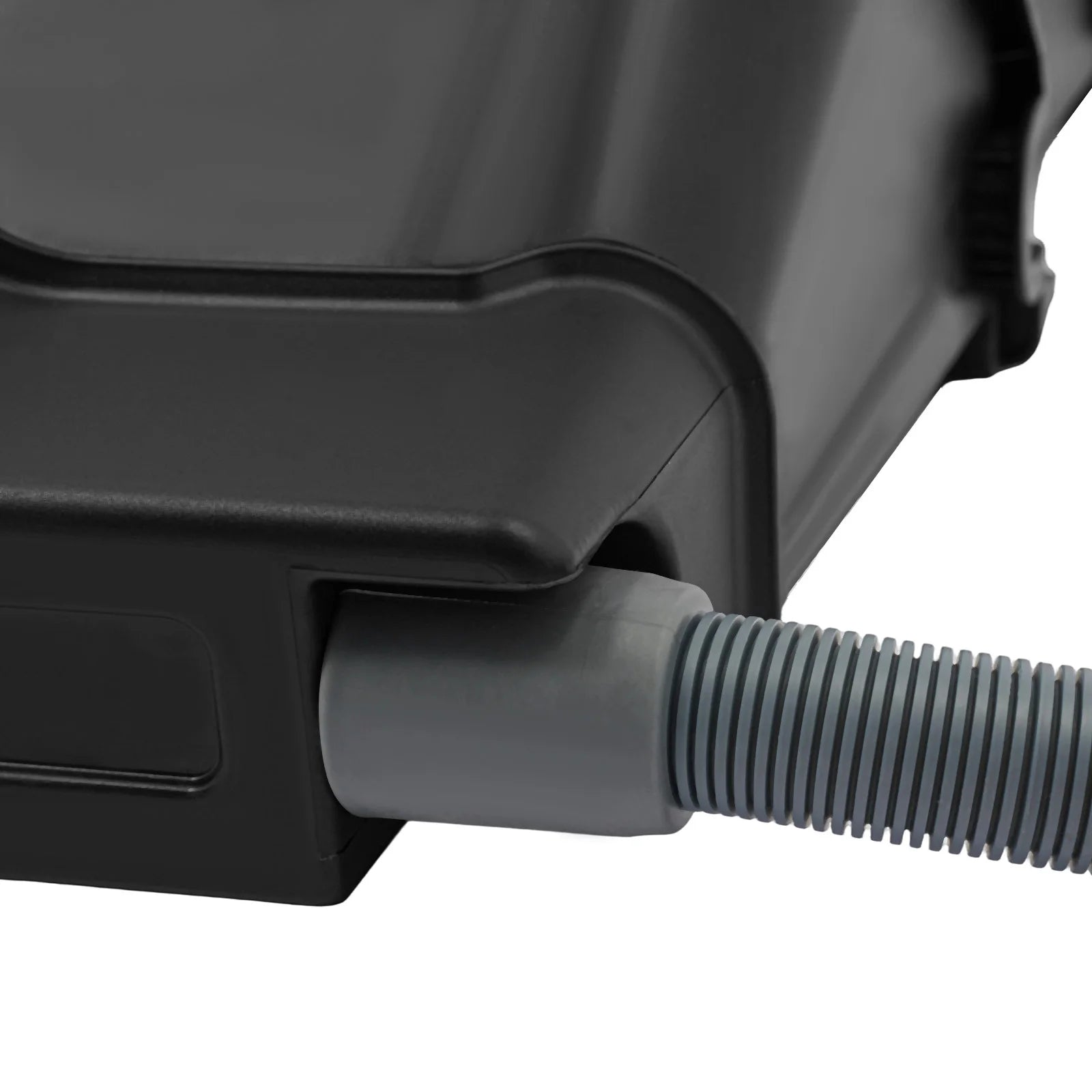 Close-up of black planter connector with gray corrugated hose attached