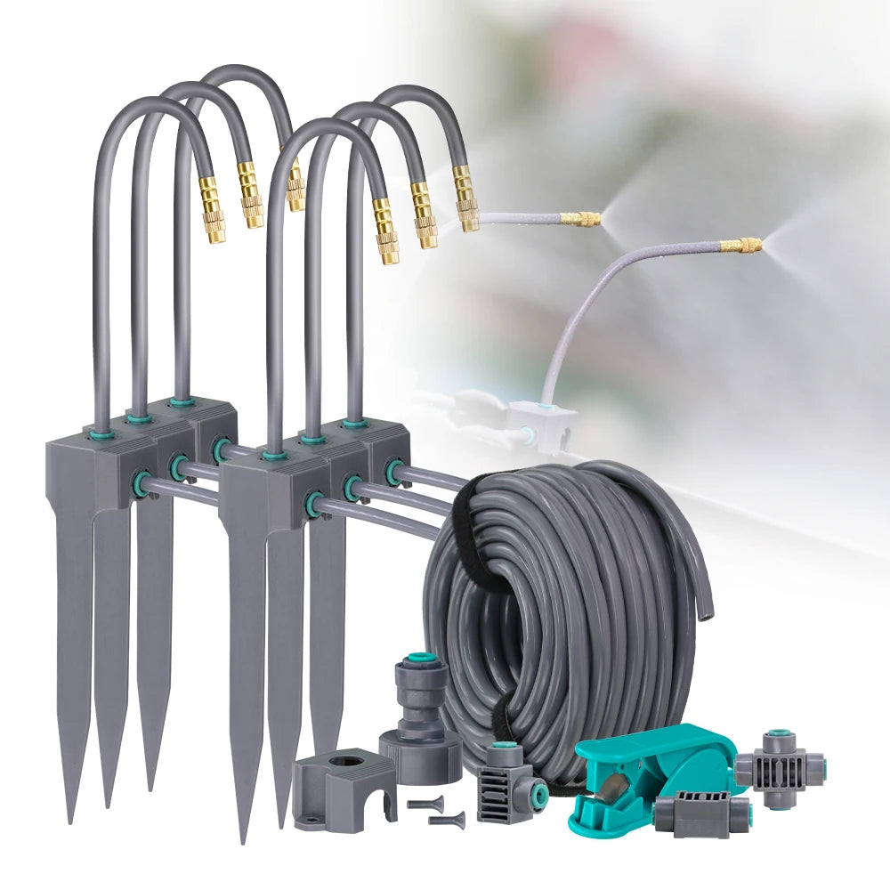 Garden misting irrigation kit with multiple gray stakes, brass nozzles, and hose coil