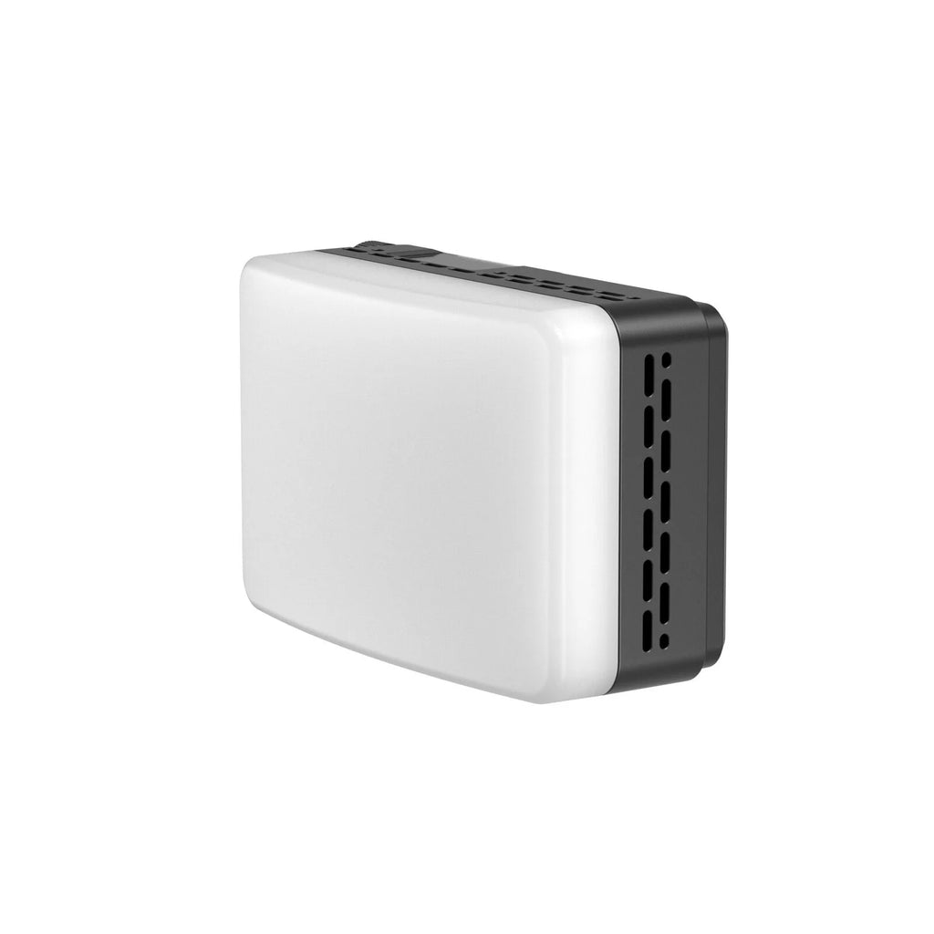 Rectangular LED video light with a white diffuser panel and black vented casing for portable photography lighting.