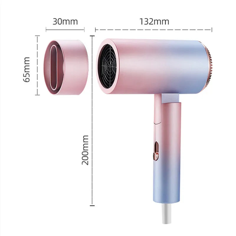 Gradient pink and blue foldable mini ionic hair dryer with magnetic nozzle attachment, showing precise dimensions.