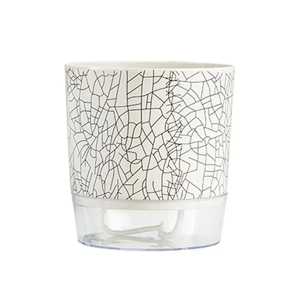 Self-watering planter pot with cracked-ice patterned sleeve and clear lower water chamber