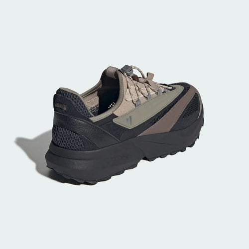 Adidas Lightblaze Vista sneakers in black and taupe mesh and synthetic, featuring a thick platform sole and toggle lacing.