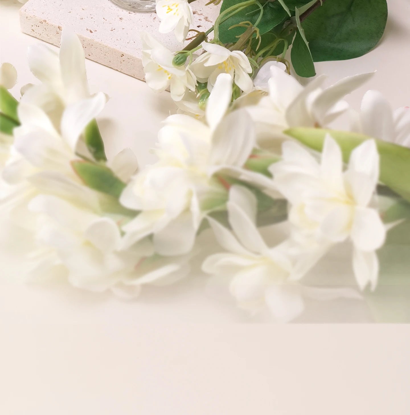 Pure Gardenia perfume: fresh white floral aesthetic with soft petals, elegant green leaves, and cream-textured base.