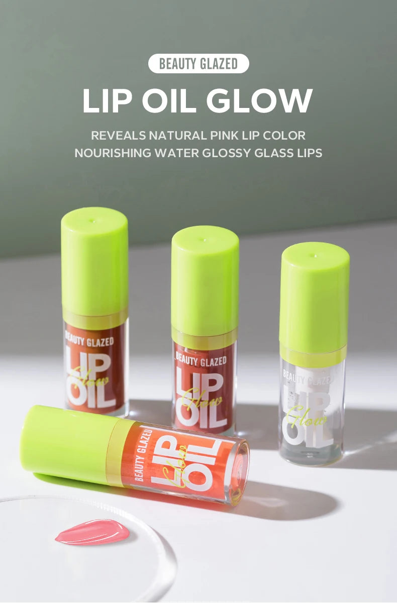 Beauty Glazed moisturizing lip oil glow with a glossy, natural pink finish in candy-colored packaging.