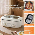 White electric hot pot on table with double temperature control knobs and open lid