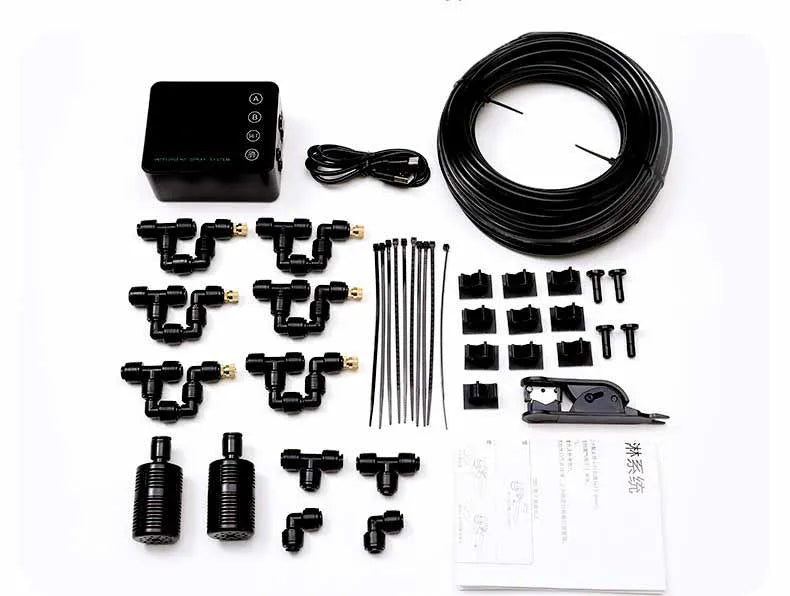 Spray system kit parts set including black controller, tubing coil, nozzles, and connectors